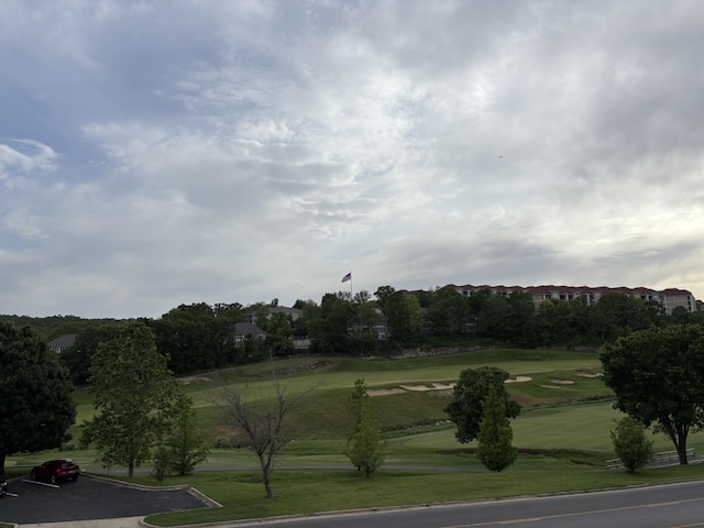 330 S Wildwood Dr Unit B1, Branson, MO 65616 - view of mountain backdrop with a local golf course