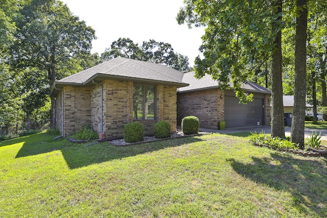 3723 N Vera Cruz Dr, Springfield, MO 65803 - view of front of property with brick siding, a garage, a shingled roof, and concrete driveway