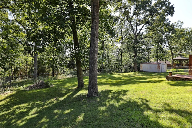 3723 N Vera Cruz Dr, Springfield, MO 65803 - fenced backyard featuring a storage unit and a gazebo