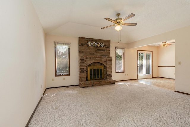 3723 N Vera Cruz Dr, Springfield, MO 65803 - unfurnished living room with light carpet, a ceiling fan, and a fireplace