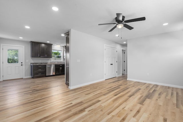 407 W Adamson St, Miller, MO 65707 - unfurnished living room featuring recessed lighting, light wood-type flooring, and a ceiling fan