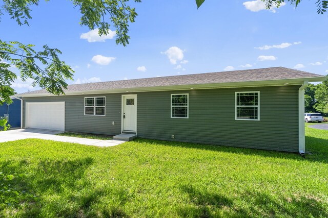 407 W Adamson St, Miller, MO 65707 - ranch-style house featuring an attached garage, a front lawn, and concrete driveway