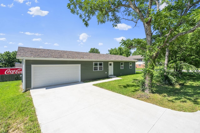 407 W Adamson St, Miller, MO 65707 - single story home with a garage, driveway, and a front lawn