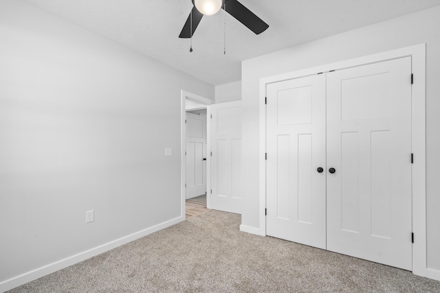 407 W Adamson St, Miller, MO 65707 - unfurnished bedroom featuring light colored carpet, a closet, and ceiling fan