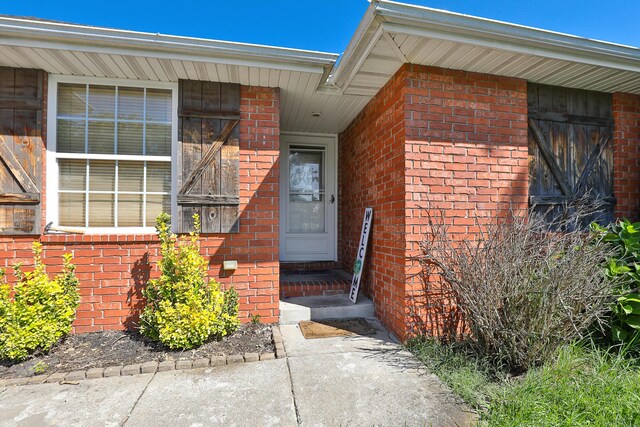 5441 Basswood Ct W, Springfield, MO 65802 - view of exterior entry with brick siding