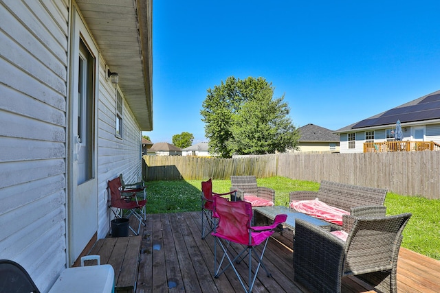 5441 Basswood Ct W, Springfield, MO 65802 - wooden deck featuring a fenced backyard and outdoor dining area