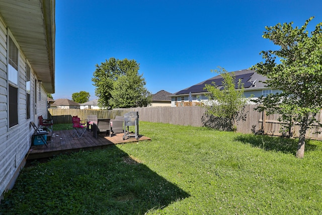 5441 Basswood Ct W, Springfield, MO 65802 - fenced backyard featuring a wooden deck