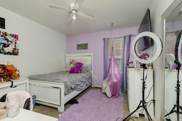 5441 Basswood Ct W, Springfield, MO 65802 - bedroom with carpet, ceiling fan, and a textured ceiling