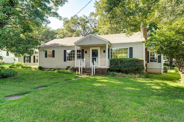 223 E Silsby St, Springfield, MO 65807 - single story home with a chimney and a front lawn