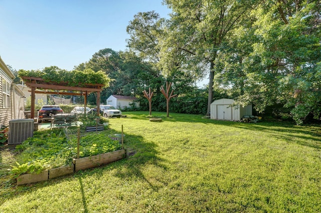 223 E Silsby St, Springfield, MO 65807 - view of green lawn with a storage shed, a garden, and a pergola
