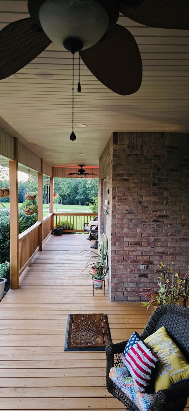106 Finch Dr, Strafford, MO 65757 - wooden porch with ceiling fan