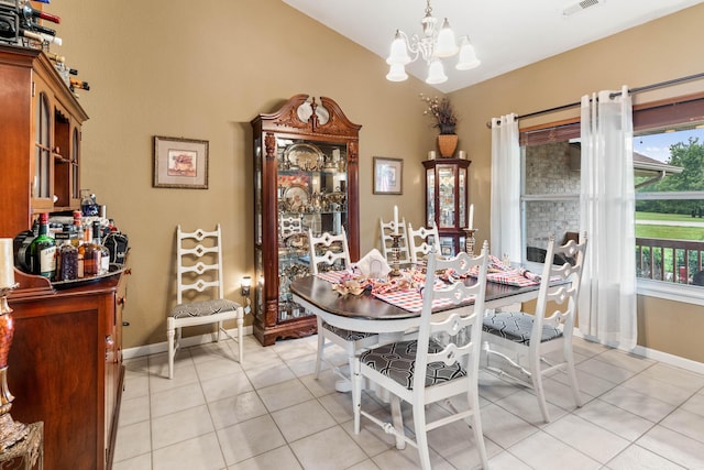 106 Finch Dr, Strafford, MO 65757 - dining room with light tile patterned flooring and a chandelier