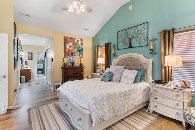 106 Finch Dr, Strafford, MO 65757 - bedroom featuring wood finished floors, lofted ceiling, and ceiling fan
