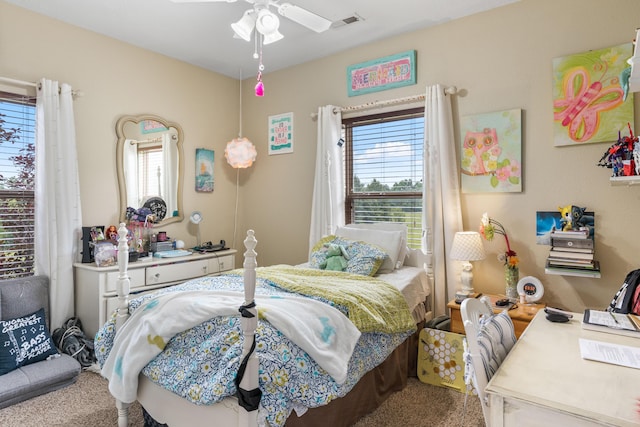 106 Finch Dr, Strafford, MO 65757 - carpeted bedroom featuring multiple windows and ceiling fan