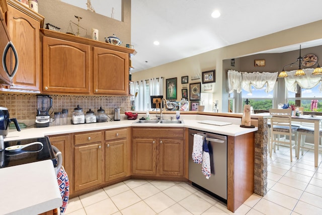 106 Finch Dr, Strafford, MO 65757 - kitchen featuring dishwasher, a peninsula, tasteful backsplash, light countertops, and recessed lighting
