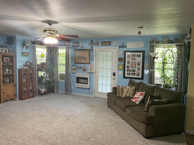 4811 State Route Cc, West Plains, MO 65775 - carpeted living room featuring heating unit, a ceiling fan, and a textured ceiling