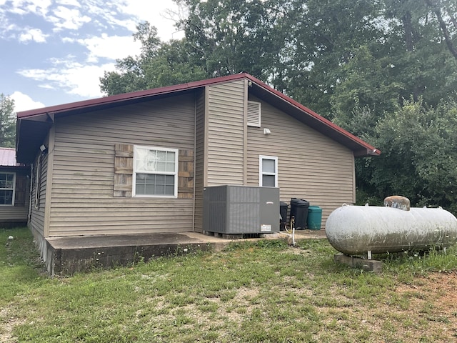 4811 State Route Cc, West Plains, MO 65775 - view of property exterior with a central air condition unit and a yard