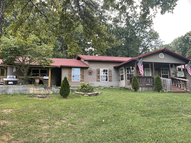 4811 State Route Cc, West Plains, MO 65775 - ranch-style home with a porch, a front yard, and a metal roof