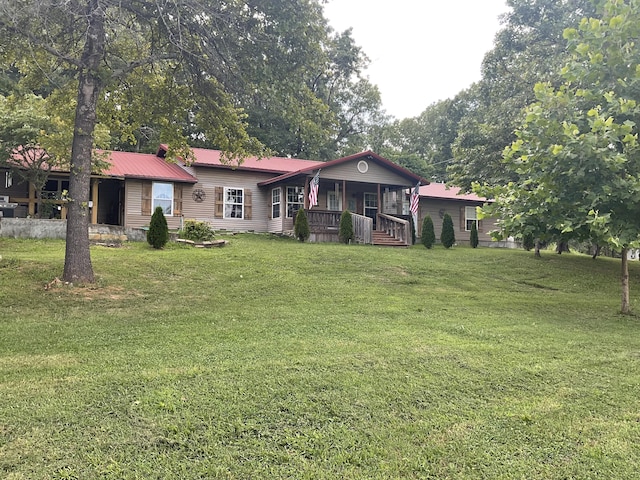 4811 State Route Cc, West Plains, MO 65775 - back of property featuring a porch, a yard, and a metal roof