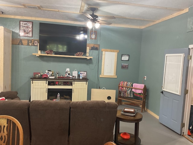 4811 State Route Cc, West Plains, MO 65775 - living area with a ceiling fan and concrete flooring