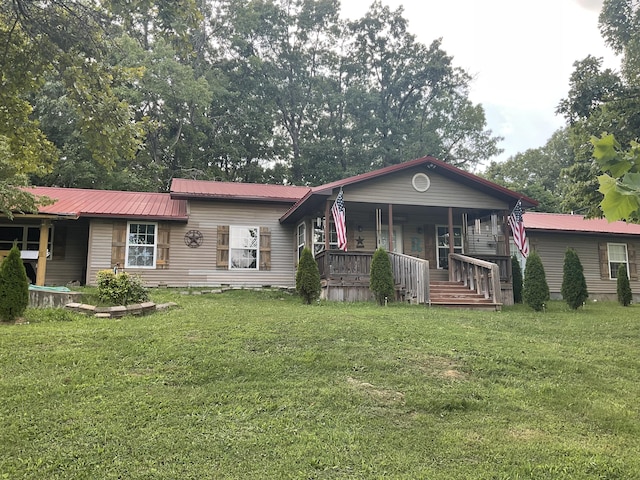 4811 State Route Cc, West Plains, MO 65775 - view of front of property with a front yard, a porch, and a metal roof