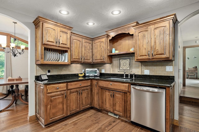 623 E Weaver Rd, Springfield, MO 65810 - kitchen with dishwasher, wood finished floors, a chandelier, decorative backsplash, and recessed lighting
