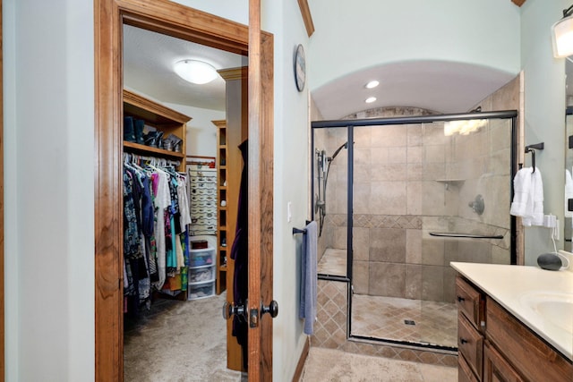 623 E Weaver Rd, Springfield, MO 65810 - bathroom with vanity, a shower stall, and a spacious closet
