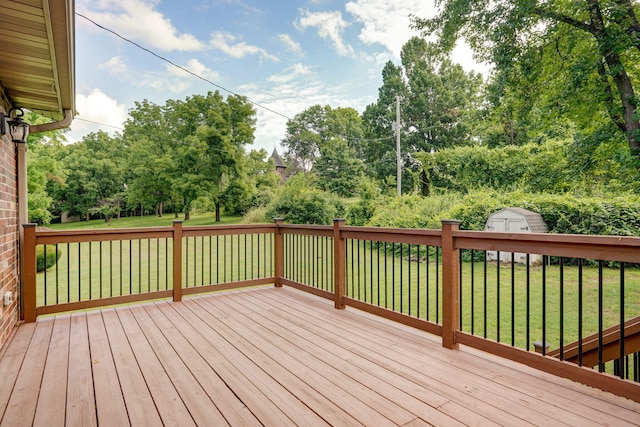 623 E Weaver Rd, Springfield, MO 65810 - wooden deck with a shed, a yard, and view of wooded area