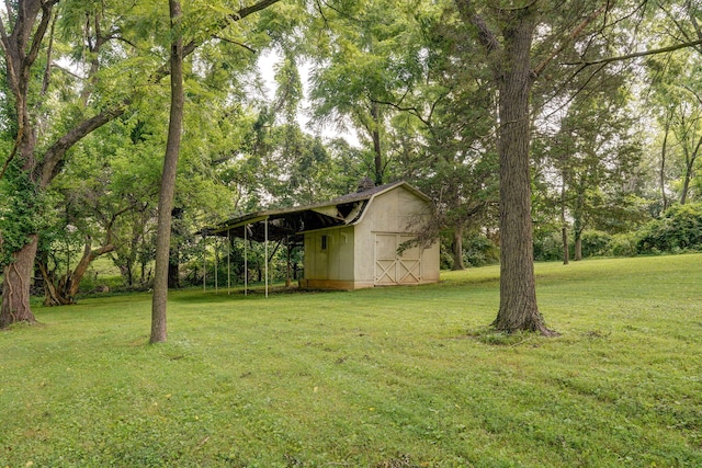 623 E Weaver Rd, Springfield, MO 65810 - view of grassy yard featuring a storage unit
