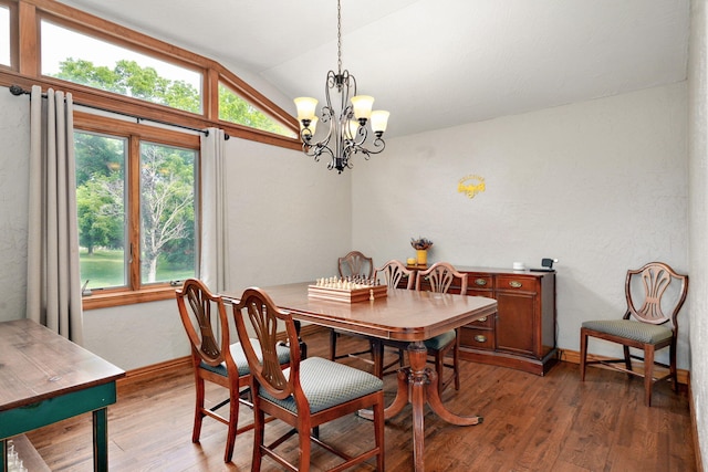 623 E Weaver Rd, Springfield, MO 65810 - dining space featuring lofted ceiling, wood finished floors, and a chandelier
