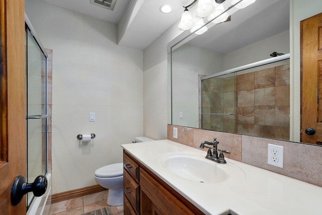 623 E Weaver Rd, Springfield, MO 65810 - bathroom with vanity, tiled shower, and decorative backsplash