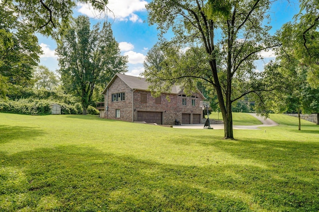 623 E Weaver Rd, Springfield, MO 65810 - view of green lawn featuring an attached garage