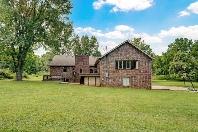 623 E Weaver Rd, Springfield, MO 65810 - back of house with a wooden deck, a chimney, brick siding, and a lawn