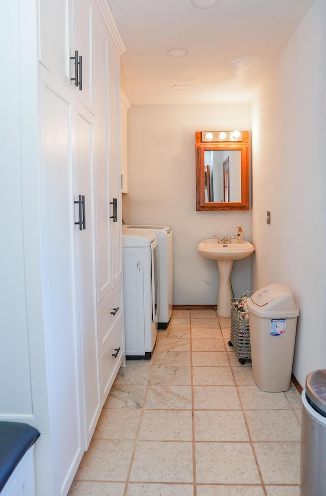258 State Highway 32, Buffalo, MO 65622 - bathroom with washer and clothes dryer and a sink