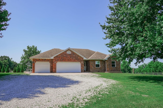 258 State Highway 32, Buffalo, MO 65622 - single story home with gravel driveway, a front yard, a garage, brick siding, and a shingled roof