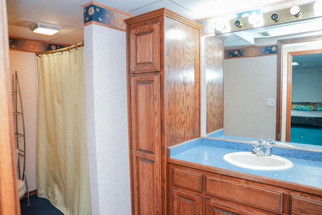 258 State Highway 32, Buffalo, MO 65622 - full bathroom with vanity, a textured wall, and a shower with curtain
