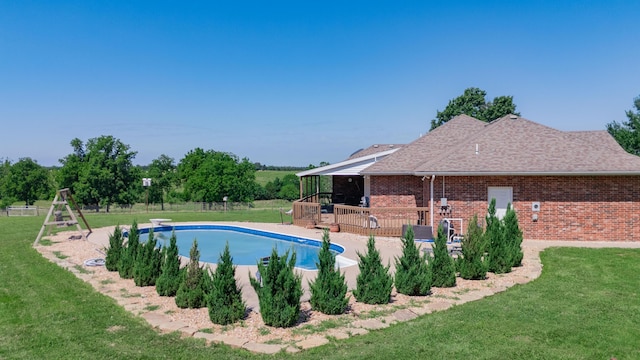 258 State Highway 32, Buffalo, MO 65622 - swimming pool featuring a lawn and a deck