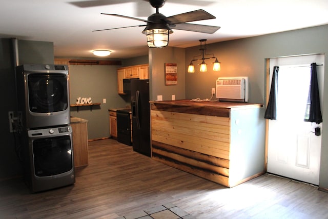 2240 Mease Dr, Reeds Spring, MO 65737 - kitchen featuring stacked washer / drying machine, black refrigerator with ice dispenser, dark wood-style flooring, stove, and a ceiling fan