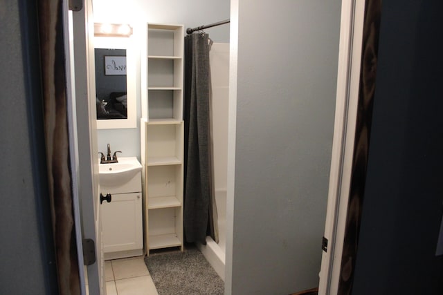 2240 Mease Dr, Reeds Spring, MO 65737 - bathroom with vanity, tile patterned floors, and a shower with shower curtain