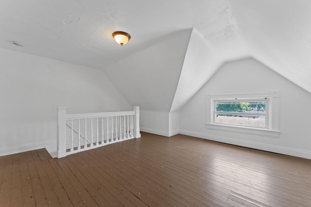 1201 N Broadway Ave, Springfield, MO 65802 - bonus room featuring vaulted ceiling and hardwood / wood-style flooring