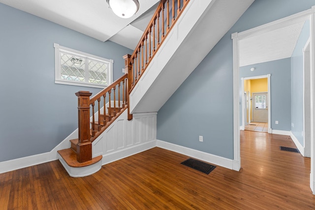 1201 N Broadway Ave, Springfield, MO 65802 - stairs with wood finished floors