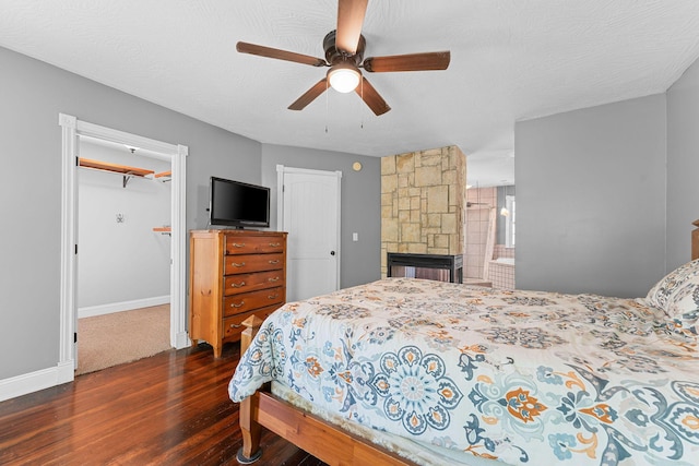 1201 N Broadway Ave, Springfield, MO 65802 - bedroom with wood finished floors, a ceiling fan, and a closet