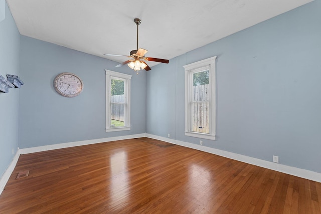 1201 N Broadway Ave, Springfield, MO 65802 - unfurnished room with a ceiling fan and hardwood / wood-style floors