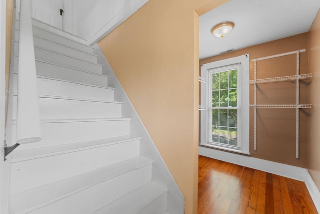 1201 N Broadway Ave, Springfield, MO 65802 - staircase featuring wood-type flooring