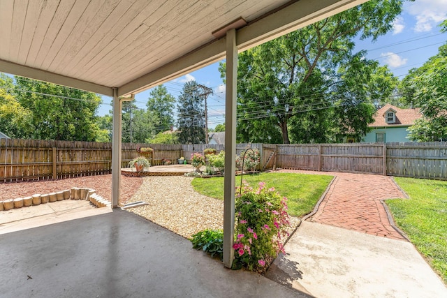 1201 N Broadway Ave, Springfield, MO 65802 - fenced backyard with a patio area