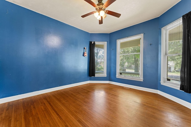 1201 N Broadway Ave, Springfield, MO 65802 - unfurnished room with plenty of natural light, wood finished floors, and ceiling fan