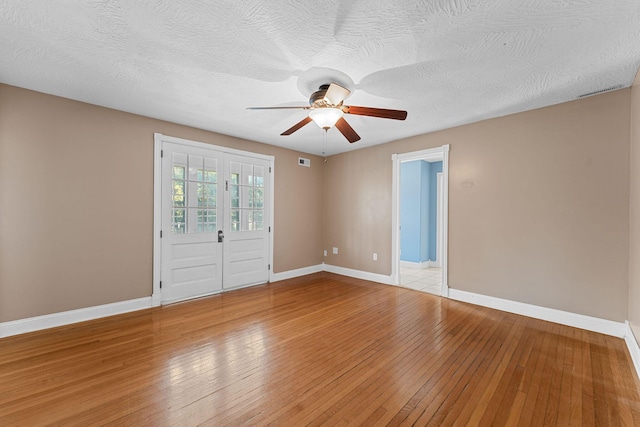 1201 N Broadway Ave, Springfield, MO 65802 - unfurnished room with light wood-style flooring and a ceiling fan