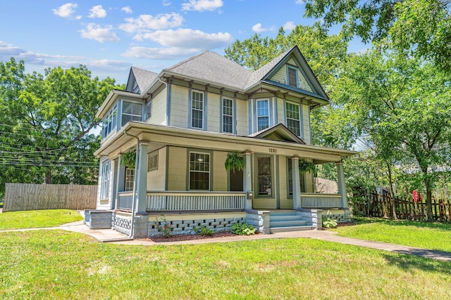 1201 N Broadway Ave, Springfield, MO 65802 - victorian-style house with covered porch and a shingled roof