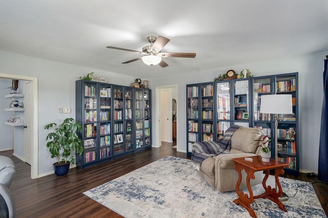 12655 Lawrence Unit 2155, Mount Vernon, MO 65712 - living area featuring dark wood finished floors and a ceiling fan