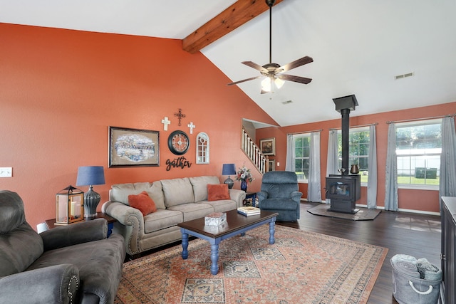 12655 Lawrence Unit 2155, Mount Vernon, MO 65712 - living area featuring a wood stove, a ceiling fan, beamed ceiling, dark wood-style floors, and stairs